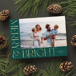 Elegant Modern Merry & Bright 1 Photo Green Gold<br><div class="desc">This festive holiday photo card features one horizontal photo,  elegant yet simple typography,  and a beautiful deep green background. The raised foil greeting on the front says "Merry & Bright".  You can also add another photo and/or additional text to the back!</div>