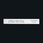 Elegant Modern Newspaper Merry Christmas<br><div class="desc">Create an elegant and modern wrap-around label inspired by a classic newspaper design, perfect for adding a sophisticated touch to your Merry Christmas greeting. The label features sleek black and white elements with minimalist typography, mimicking the look of a traditional newspaper headline. The text highlights a bold 'Merry Christmas' message,...</div>