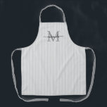 Elegant Monogram Name Gray Stripe Apron<br><div class="desc">Add a touch of elegance to everyday cooking and baking with this feminine personalized apron. Featuring a soft gray and white striped background, this stylish apron is beautifully finished with your initial and name in a fancy script font, creating a timeless and sophisticated look. Perfect for home cooks, bakers, entertainers,...</div>