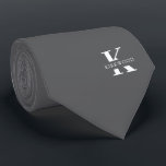 Elegant Monogram | Silver | One-Sided Tie<br><div class="desc">An elegant necktie featuring a bold white monogram across a black background.  On top of this monogram sits your first or last name spelled out in all capitals.
Over 40  unique colors are available in both one-sided and two-sided versions. You can browse them by clicking the collection link.</div>
