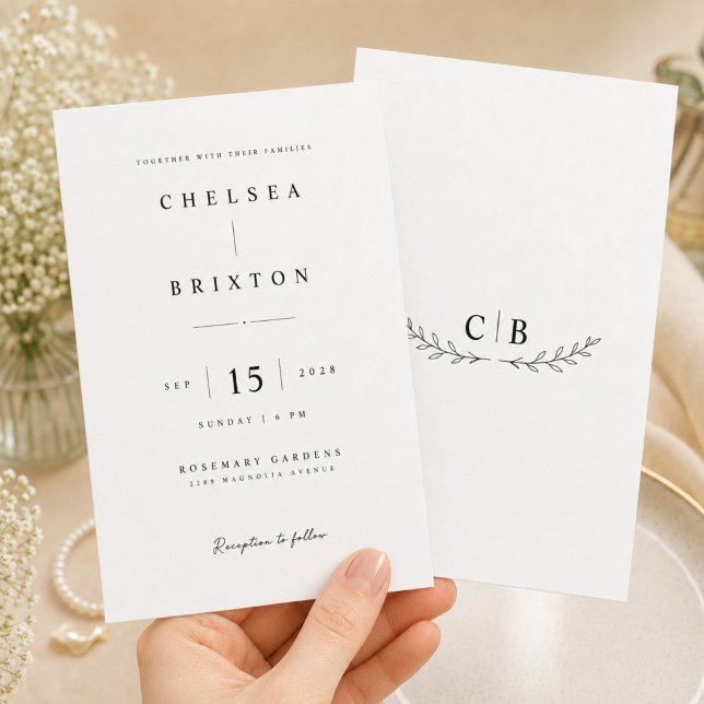 Elegant Monogram Wedding Invitation Template. (Creator Uploaded)