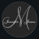 Elegant Monogrammed Black & White Wedding Sticker<br><div class="desc">Design by Elke Clarke ©2008, 2009, 2010. This design is simple yet classic and fits with any invitation and wedding theme. THE MONOGRAM GALLERY allows you to customise the names, monogram and colours of this sticker. Just click on the "CUSTOMIZE" button and follow the prompts. The matching invitation designs are...</div>