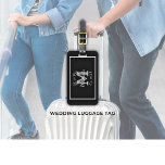 Elegant Mr and Mrs Name Black Wedding Luggage Tag<br><div class="desc">A simple yet elegant black and white Mr. & Mrs. Monogrammed Wedding LUGGAGE TAG for Bride and Groom's new married life & name. Customise with the Newlywed's Last Name and Initial. Announce your newly married status to the world!</div>
