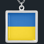 Elegant Necklace with Flag of Ukraine<br><div class="desc">Wear your Ukrainian pride close to your heart with this stunning necklace featuring the flag of Ukraine! Crafted with precision and attention to detail, this necklace proudly displays the iconic design of the Ukrainian flag – featuring two horizontal bands of blue and yellow. The vibrant colours and striking simplicity of...</div>