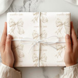 Elegant Neutral Bow Wrapping Paper<br><div class="desc">Add a touch of sophistication to your gift-giving with this Elegant Neutral Bow Wrapping Paper. Featuring delicate, soft ivory bows beautifully arranged on a white background, this design is perfect for weddings, bridal showers, baby showers, birthdays, and other special occasions. The gentle pastel tones and stylish bow pattern bring an...</div>