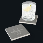 Elegant Newlyweds Established Monogram Name Grey Stone Coaster<br><div class="desc">Give a perfect keepsake with this Elegant Newlyweds Established Monogram Name Grey Stone Coaster. It is a modern customisable design in dark grey, white and light grey. Bride and groom's first names are on the centre in modern white handwriting script lettering and initial of new last name is in grey....</div>