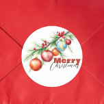Elegant Pine Branch with Christmas Decorations Classic Round Sticker<br><div class="desc">This delightful Christmas sticker features a festive design perfect for spreading holiday cheer. At the centre, a lush green pine branch is adorned with shiny red and blue Christmas balls, each accented with reflective highlights that give them a three-dimensional appearance. A bright red bow is tied to the top of...</div>