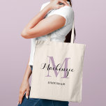 Elegant Purple Custom Wedding Bridesmaid Name Tote Bag<br><div class="desc">Elegant custom wedding tote bag features a personalised monogram typography design with modern calligraphy script name and serif monogram initial in lavender purple and black colours. Includes custom text for a bridal party title like "BRIDESMAID" or other preferred wording.</div>