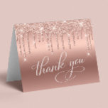 Elegant Rose Gold Glitter 60th Birthday Party Thank You Card<br><div class="desc">Chic folded thank you card for your 60th birthday party featuring "Thank You" in elegant white calligraphy,  a rose gold faux foil background and rose gold faux glitter. On the inside,  personalise your thank you message and signature or leave blank for a handwritten note.</div>