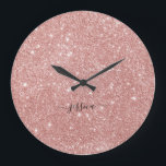 Elegant rose gold glitter script name   large clock<br><div class="desc">Modern wall clock with a girly rose gold glitter background design and a hand lettered black script. Personalise with your name.</div>