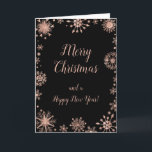 Elegant Rose Gold Snowflakes Merry Christmas Holiday Card<br><div class="desc">A beautiful Christmas card design featuring elegant rose gold snowflakes on a black background. Inside there is a space for a message. A perfect way to greet your friends and relatives in this festive season. The page background colour and the text can be changed to suit your own requirements. Graphics...</div>