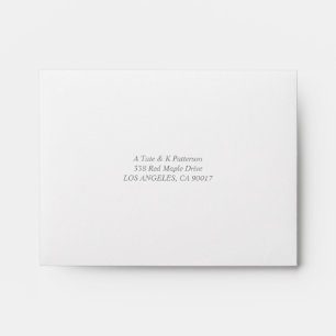 Elegant RSVP envelope with pink lining
