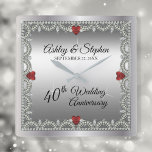 Elegant Ruby | Diamonds 40th Wedding Anniversary Square Wall Clock<br><div class="desc">Opulent elegance frames this 40th wedding anniversary design in a unique scalloped diamond design with centre teardrop diamond with heart-shaped ruby accents and faux added sparkles on a silver-tone gradient. Please note that all embellishments are printed and are only made to appear as real as possible in a flat, printed...</div>