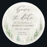 Elegant Rustic Pine Trees Save The Date Classic Round Sticker<br><div class="desc">Our "Rustic Mountain" collection features watercolor landscapes paired with wood slice decorative items creating a sophisticated nature inspired look. Colour scheme consists of muted browns and blues with a touch of green. All information is in a combination of a script and serif font. Check our store for more items from...</div>