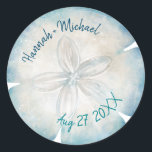 Elegant Sand Dollar Name Beach Wedding Classic Round Sticker<br><div class="desc">Create your own unique sand dollar beach wedding stickers to use on your guest favours/gifts, or as elegant envelope seals to accent your tropical invitations... The beautiful watercolor artwork created by Raphaela Wilson depicts a single sand dollar shell in popular nautical shades of deep ocean blue, light teal, and ivory...</div>