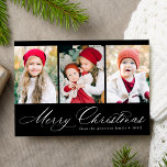 Elegant Script Black Merry Christmas 3 Photo Holiday Card<br><div class="desc">Simple Christmas card featuring three vertical photos and "Merry Christmas" displayed in a festive white calligraphy script on a black background. Personalise the front of the multi-photo Christmas card with your family name and the year. The card reverses to display a modern black and white plaid pattern.</div>