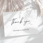 Elegant Script Black White Wedding Thank You Postcard<br><div class="desc">Simple and Modern Calligraphy Script Thank You Postcard in black and white to send out after your wedding. Customise it with your own names on the front and message on the back or delete the text on the back and add your handwritten note.</div>