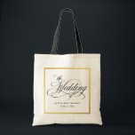 Elegant Script Flourishes Personalised Wedding Tote Bag<br><div class="desc">Delight your wedding party or special guests with a custom tote personalised with the names of the bride and groom and the wedding date. Beautiful calligraphy script text surrounded by a gold square border accent this design.</div>