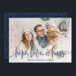 Elegant Script Full Photo Hope Love Hugs Navy Holiday Card<br><div class="desc">Send love this season to your family and friends with these modern styled cards by Orabella Prints. Elegant text overlay reads, "hope, love, & hugs" in navy blue over a white gradient overlay on the bottom of the card. The back features tiny white snow dots over a navy blue background,...</div>