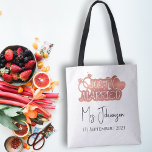 Elegant Script Just Married Rose Gold Honeymoon Tote Bag<br><div class="desc">Celebrate your newlywed bliss with our Elegant Script Just Married Rose Gold Logo Honeymoon Tote Bag. This chic and customisable tote features a graceful "Just Married" rose gold script logo, with the option to personalise it with your last name and wedding date below. Perfect for your honeymoon or any romantic...</div>