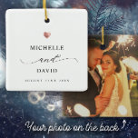 Elegant Script Minimal Rose Gold Heart Wedding Ceramic Ornament<br><div class="desc">Modern wedding ornament with your custom names in an elegant swirly script calligraphy design alongside a printed rose gold heart and the date of your celebration. On the back is space for your favourite photo of the nuptials. This is the minimalist black and white version. Great keepsake gifts for newlyweds!...</div>