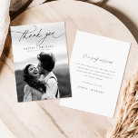 Elegant Script Modern Photo Wedding Thank You Card<br><div class="desc">Express your gratitude with our Elegant Script Modern Photo Wedding Thank You Card. This card features a handwritten calligraphy script, paired with a stunning black and white photo of the newlyweds. The simple and minimalistic design exudes classic rustic elegance, making it perfect for contemporary couples. The digital overlay type adds...</div>