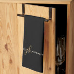Elegant Script Monogram Initials Black Gold Modern Tea Towel<br><div class="desc">Personalised modern kitchen towel with simple, elegant handwritten calligraphy script initials or monogram and name in gold and white against an editable black background for a stylish or professional look. CHANGES: Change the background colour, choose a styled graphics background or change the text font style, colour, size and placement by...</div>