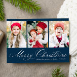 Elegant Script Navy Merry Christmas 3 Photo Holiday Card<br><div class="desc">Simple Christmas card featuring three vertical photos and "Merry Christmas" displayed in a festive white calligraphy script on a navy background. Personalise the front of the multi-photo Christmas card with your family name and the year. The card reverses to display a modern navy and white plaid pattern.</div>