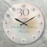 Elegant Script Pearl 30th Wedding Anniversary Large Clock<br><div class="desc">Featuring beautiful pearls,  this chic 30th wedding anniversary clock can be personalized with your special pearl anniversary information on a pearl background. Designed by Thisisnotme©</div>
