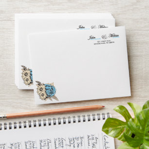 elegant script with rose on the corner envelope
