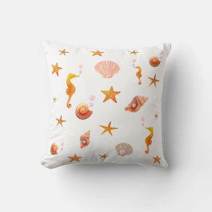 Elegant seahorses, shells & sea stars on white cushion