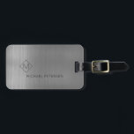 Elegant silver monogrammed name modern luggage tag<br><div class="desc">Modern luxury exclusive looking luggage tag on a faux metallic brushed silver grey background with geometric diamond shaped monogram. Personalise it with your name,  monogram,  and details on both sides!</div>