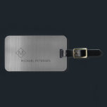 Elegant silver monogrammed name modern luggage tag<br><div class="desc">Modern luxury exclusive looking luggage tag on a faux metallic brushed silver grey background with geometric diamond shaped monogram. Personalise it with your name,  monogram,  and details on both sides!</div>