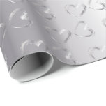 Elegant Silver Wedding Hearts Wrapping Paper<br><div class="desc">Elegant Silver with Silver Hearts Wedding Gift Wrap. Also great for anniversaries. Made with high resolution vector graphics for a professional print. NOTE: (All zazzle product designs are "prints" unless otherwise stated) If you have any questions about this product please contact me at siggyscott@comcast.net or visit my store link: http://www.zazzle.com/designsbydonnasiggy?rf=238713599140281212...</div>