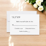 Elegant Simple Black And White Chic Modern Wedding RSVP Card<br><div class="desc">This elegant black and white RSVP Card is perfect for a modern wedding. the simple design features elegant black calligraphy on a white background.</div>