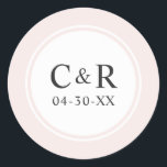 Elegant Simple Pale Pink Wedding Monogram Classic Round Sticker<br><div class="desc">Elegant and chic wedding favour sticker features a modern and simple style circle-framed monogram design that can be personalised with the bride and groom initials and wedding date in a soft black colour. Pale pink background colour can be customised.</div>