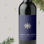 Elegant Snowflake Wine Label<br><div class="desc">Elevate your holiday celebrations with this Elegant Snowflake Wine Label. This exquisite label design features a captivating snowflake against a deep navy blue background, exuding the magic and charm of the festive season. The customisable lower thirds allows you to add a personalised touch, making it a perfect addition to your...</div>