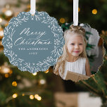 Elegant Snowflake Wreath Ice Blue Photo Christmas Tree Decoration Card<br><div class="desc">Elegant holiday photo ornament card featuring "Merry Christmas" displayed in a white calligraphy script encircled by a wreath of snowflakes and pine branches on a frosted blue background. Personalise the front of the ornament card by adding your family name and the year. The back of the paper ornament features your...</div>