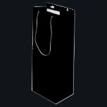 Elegant Solid Black Wine Gift Bag<br><div class="desc">🖤 Black Black is the color resulting from the complete absorption of visible light, making it the darkest shade. In light, it represents the absence of all color. In pigment, it is the combination of all colors, blended until no individual hue remains. Cultural & Psychological Meaning: Symbolism: Often associated with...</div>