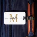 Elegant Stylish White Gold Monogram Initial Script Luggage Tag<br><div class="desc">Girly Stylish Modern Elegant White and Gold Monogram Initial Name Script Custom Personalised Personalised Luggage Bag Tag. This design featuring a first name in a pretty hand lettered swash tail font calligraphy (or typography) with monogram initial, address info in gold and black on white colour background. These are easy to...</div>