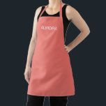 Elegant Sunset Coral Personalised Name -  Apron<br><div class="desc">Cook, bake, or create in style with this sunset coral all-over print apron, featuring a chic minimalist design and your personalised name (like Aurora) in a graceful font. Designed for both comfort and fashion, this apron makes a beautiful statement in any kitchen or creative space. Ideal for home cooks, bakers,...</div>