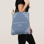 Elegant Vintage Dusty Blue Wedding Bridesmaid's Tote Bag<br><div class="desc">Bridesmaid's Gift Idea: This dusty blue bridesmaid's tote bag is the perfect gift for your bridal party! The design features a vintage corners design in dusty blue. It has the word "Bridesmaid" on the front with her name and initial on the back. See below for matching elegant vintage dusty blue...</div>
