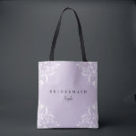 Elegant Vintage Lavender Wedding Bridesmaid's Gift Tote Bag<br><div class="desc">Bridesmaid's Gift Idea: This lavender / lilac / light purple bridesmaid's tote bag is the perfect gift for your bridal party! The design features a vintage corners design in lavender / lilac / light purple. It has the word "Bridesmaid" on the front with her name and initial on the back....</div>
