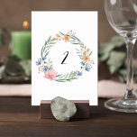 Elegant Watercolor Floral Wedding Table Number<br><div class="desc">Add a graceful touch to your reception tables with this elegant watercolor floral wreath wedding table number card. A delicate botanical wreath of soft greenery and romantic blooms surrounds the table number, creating a refined focal point that is both stylish and easy for guests to read. The floral arrangement features...</div>
