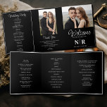 Elegant Wedding Monogram Tri-Fold Wedding Program Holiday Card<br><div class="desc">Introducing our Black And White Elegant Wedding Monogram Tri-Fold Wedding Program, where sophistication meets functionality for a seamless ceremony experience. Crafted with meticulous attention to detail, this tri-fold wedding program is the epitome of timeless elegance. The classic combination of black and white exudes understated charm, while the inclusion of your...</div>