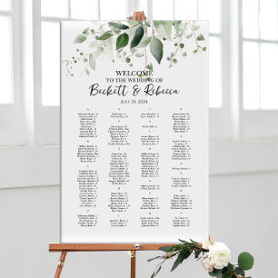 Elegant wedding seating chart with greenery