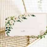 Elegant White Floral Flat Wedding Place Card<br><div class="desc">This elegant white floral flat wedding place card is perfect for a classic wedding reception. The modern vintage design features beautifully romantic ivory and cream watercolor rose and peony flowers with dark green leaves, greenery and botanicals. Personalise the back of the place cards with the names of the bride and...</div>