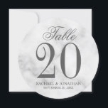 Elegant White Marble Wedding Round Table Number<br><div class="desc">Elegant Wedding Round Table Number Card
features title "Table" in grey elegant script font style with large table number and wedding details in grey serif font style on white marble background.

Also perfect for bridal shower,  birthday party,  restaurants,  special occasions parties and events.</div>