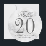 Elegant White Marble Wedding Round Table Number<br><div class="desc">Elegant Wedding Round Table Number Card
features title "Table" in grey elegant script font style with large table number and wedding details in grey serif font style on white marble background.

Also perfect for bridal shower,  birthday party,  restaurants,  special occasions parties and events.</div>
