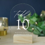 Elegant White Script Acrylic Arch Table Number<br><div class="desc">Add a modern touch to your wedding reception with our Elegant White Script Acrylic Arch Wedding Table Number Cards. These stylish cards feature white lettering in sleek, modern typography, with “Table” in an elegant calligraphy script. Available in an arched or rectangular design, each card is crafted on a frosted or...</div>